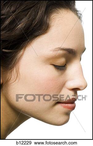 Stock Photo - Smiling teenage girl. Fotosearch