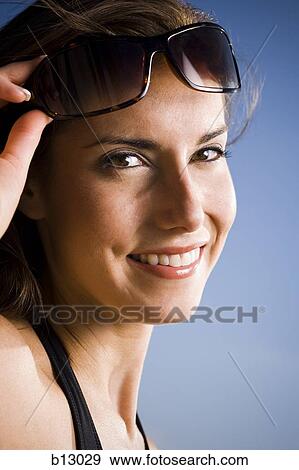 Smiling woman on beach View Large Photo Image Stock Photo - Smiling woman on beach. Fotosearch