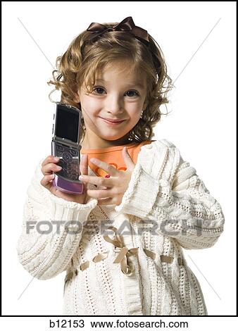 Smiling young girl in white sweater with cell phone View Large Photo Image Stock Image - Smiling young girl in white sweater with cell phone. Fotosearch