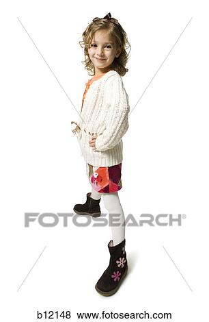 Stock Photo - Smiling young girl in white sweater. Fotosearch