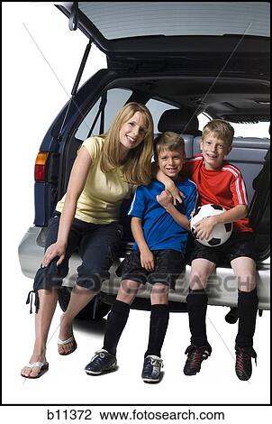 Soccer mom with sons View Large Photo Image Stock Image - Soccer mom with sons. Fotosearch