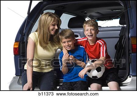 Soccer mom with sons View Large Photo Image Stock Image - Soccer mom with sons. Fotosearch