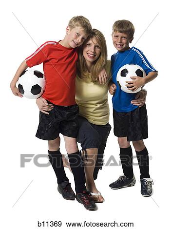 Stock Photo - Soccer mom with sons. Fotosearch