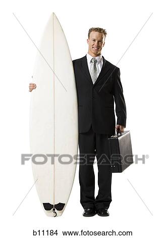 Picture - Surfing businessman. Fotosearch