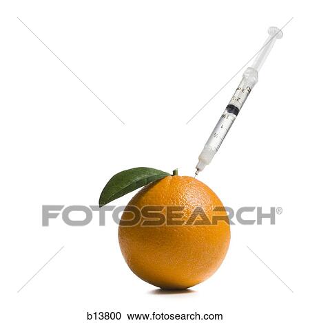Syringe in orange View Large Photo Image Stock Image - Syringe in orange. Fotosearch