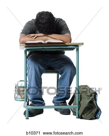 Teenage boy sleeping with his head down on a book View Large Photo Image Stock Image - Teenage boy sleeping with his head down on a book. Fotosearch