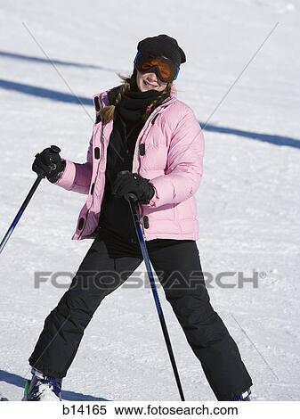 Stock Photography - Teenage girl skiing. Fotosearch