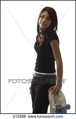 Stock Photo - Teenage girl with skateboard. Fotosearch