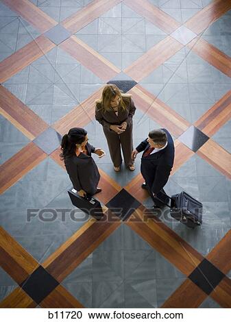 Three business colleagues in informal meeting View Large Photo Image Stock Image - Three business colleagues in informal meeting. Fotosearch