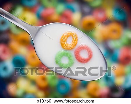 Three cereal o's on spoon in milk View Large Photo Image Stock Image - Three cereal o's on spoon in milk. Fotosearch