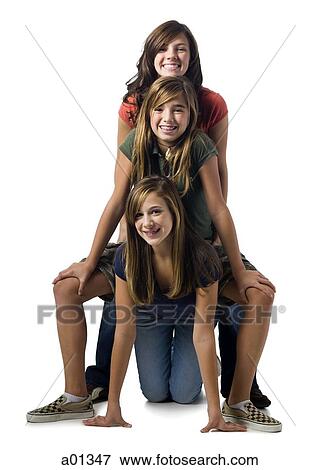 Stock Photo - Three girls smiling. Fotosearch