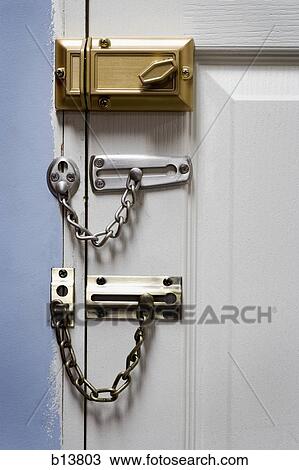 Three locks on door View Large Photo Image Stock Image - Three locks on door. Fotosearch