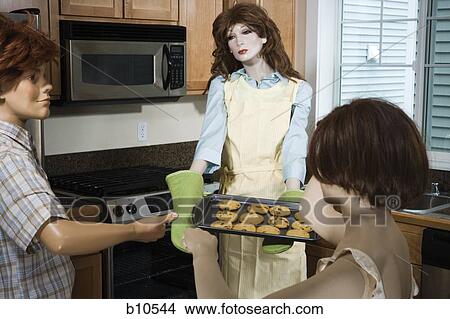 Picture - Three mannequins portraying a family. Fotosearch