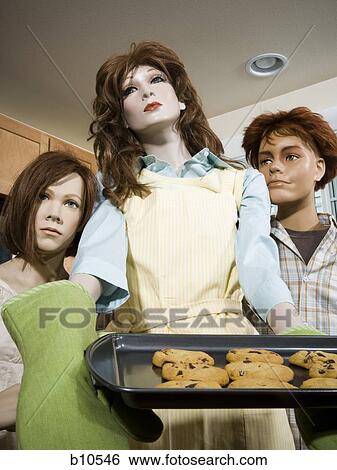 Three mannequins portraying a family View Large Photo Image Stock Photograph - Three mannequins portraying a family. Fotosearch