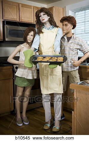 Three mannequins portraying a family View Large Photo Image Stock Photography - Three mannequins portraying a family. Fotosearch