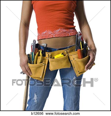 Toolbelt on a woman's waist View Large Photo Image Stock Photograph - Toolbelt on a woman's waist. Fotosearch