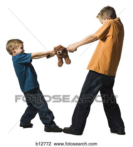 Two brothers arguing over a plush toy View Large Photo Image Stock Image - Two brothers arguing over a plush toy. Fotosearch