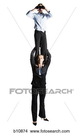 Picture - Two female contortionist businesswomen. Fotosearch