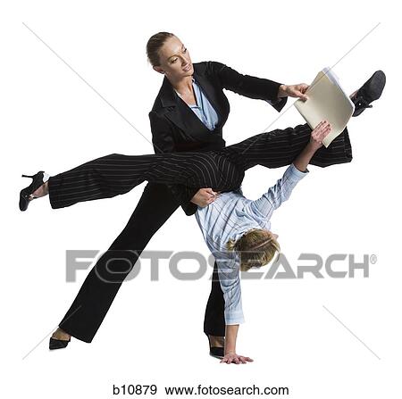 Stock Photo - Two female contortionist businesswomen. Fotosearch