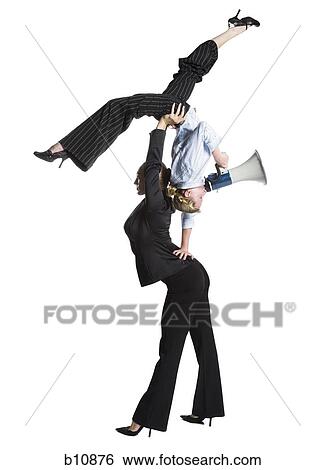 Two female contortionist businesswomen View Large Photo Image Stock Photograph - Two female contortionist businesswomen. Fotosearch