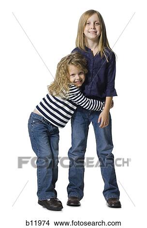 Two girls playing together View Large Photo Image Picture - Two girls playing together. Fotosearch