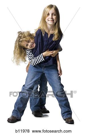 Stock Photo - Two girls playing together. Fotosearch