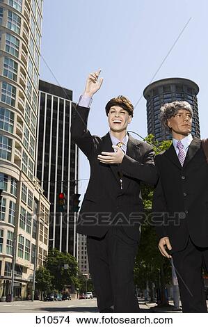 Two mannequins portraying businessmen View Large Photo Image Picture - Two mannequins portraying businessmen. Fotosearch