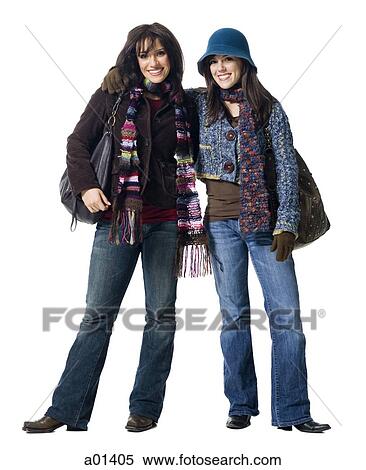Two women in winter coats smiling View Large Photo Image Stock Photography - Two women in winter coats smiling. Fotosearch