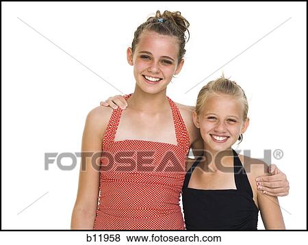 Two young sisters View Large Photo Image Stock Photo - Two young sisters. Fotosearch