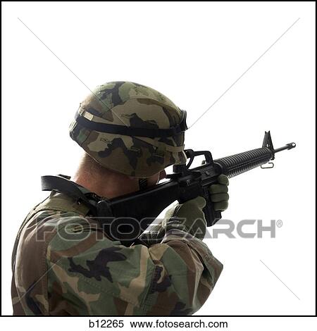 Stock Photography - US army soldier pointing gun. Fotosearch