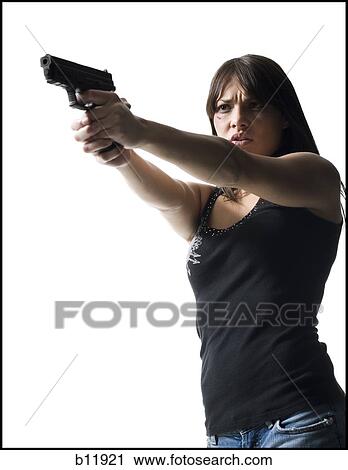 Stock Image - Violent woman with a handgun. Fotosearch