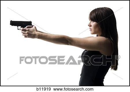 Stock Photo - Violent woman with a handgun. Fotosearch