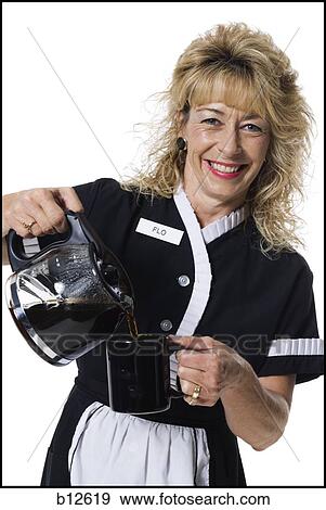 Waitress serving coffee View Large Photo Image Stock Photo - Waitress serving coffee. Fotosearch