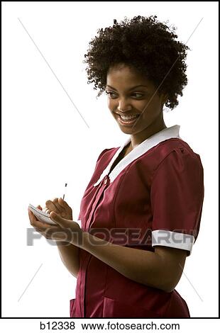 Waitress taking order View Large Photo Image Stock Photo - Waitress taking order. Fotosearch