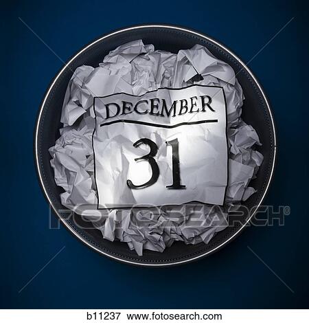 Stock Photo - Wastepaper basket with calendar sheet. Fotosearch