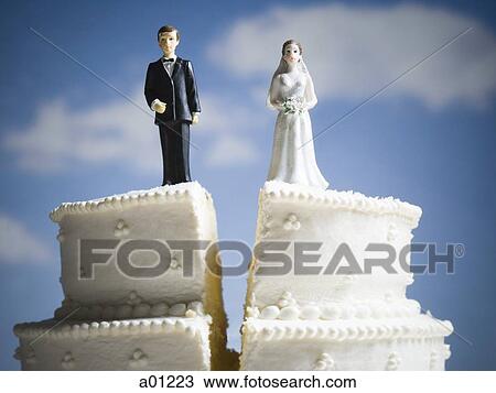 Wedding cake visual metaphor with figurine cake toppers View Large Photo Image Stock Image - Wedding cake visual metaphor with figurine cake toppers. Fotosearch