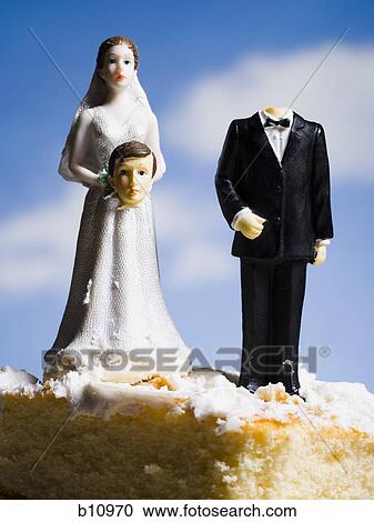 Wedding cake visual metaphor with figurine cake toppers View Large Photo Image Stock Image - Wedding cake visual metaphor with figurine cake toppers. Fotosearch