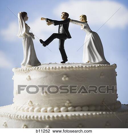 Wedding cake visual metaphor with figurine cake toppers View Large Photo Image Stock Image - Wedding cake visual metaphor with figurine cake toppers. Fotosearch