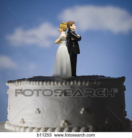 Wedding cake visual metaphor with figurine cake toppers View Large Photo Image Stock Image - Wedding cake visual metaphor with figurine cake toppers. Fotosearch