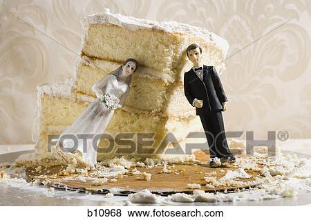 Wedding cake visual metaphor with figurine cake toppers View Large Photo Image Stock Photo - Wedding cake visual metaphor with figurine cake toppers. Fotosearch