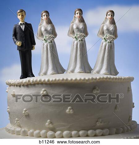 Wedding cake visual metaphor with figurine cake toppers View Large Photo Image Stock Photograph - Wedding cake visual metaphor with figurine cake toppers. Fotosearch