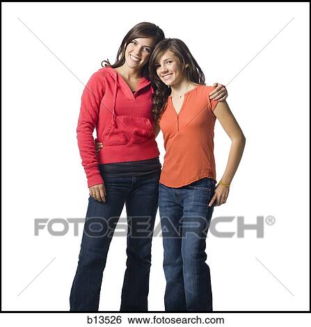 Woman and girl embracing View Large Photo Image Stock Photograph - Woman and girl embracing. Fotosearch