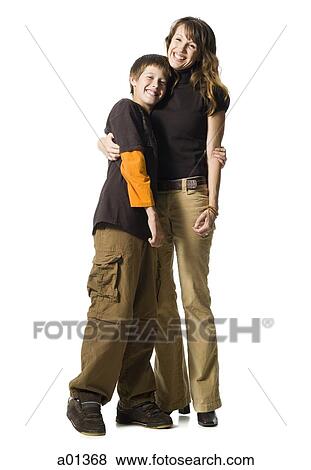 Woman embracing boy View Large Photo Image Stock Photo - Woman embracing boy. Fotosearch