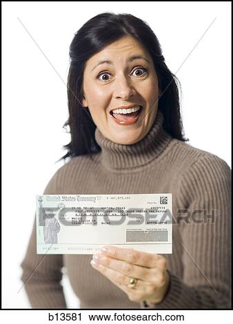 Woman holding cheque from US Treasury View Large Photo Image Stock Image - Woman holding cheque from US Treasury. Fotosearch