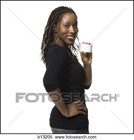 Woman holding credit card smiling View Large Photo Image Stock Photography - Woman holding credit card smiling. Fotosearch
