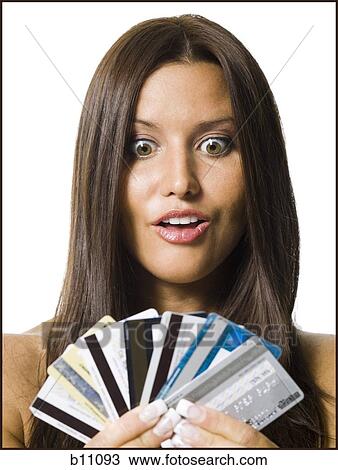 Woman holding several credit cards View Large Photo Image Stock Image - Woman holding several credit cards. Fotosearch
