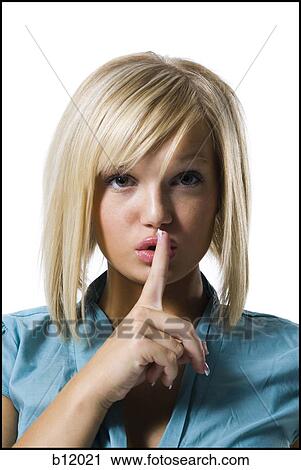 Woman hushing View Large Photo Image Stock Image - Woman hushing. Fotosearch