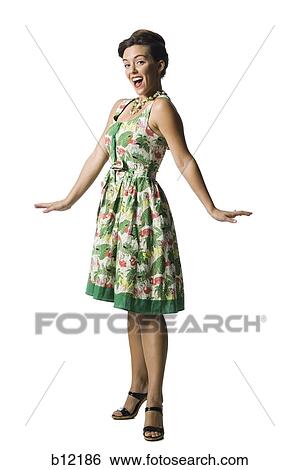 Woman in floral dress View Large Photo Image Stock Photograph - Woman in floral dress. Fotosearch