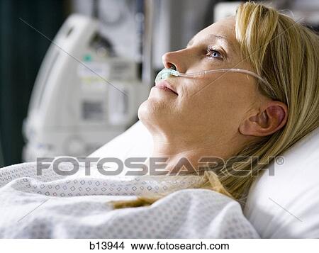 Woman in hospital with respirator View Large Photo Image Picture - Woman in hospital with respirator. Fotosearch