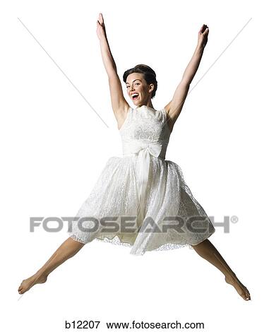 Woman in white dress jumping View Large Photo Image Stock Photo - Woman in white dress jumping. Fotosearch